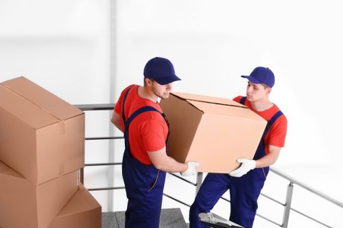 Boxes and furniture stored in a secure Southborough storage unit