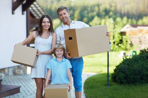 Local removals team handling furniture during a Southborough move